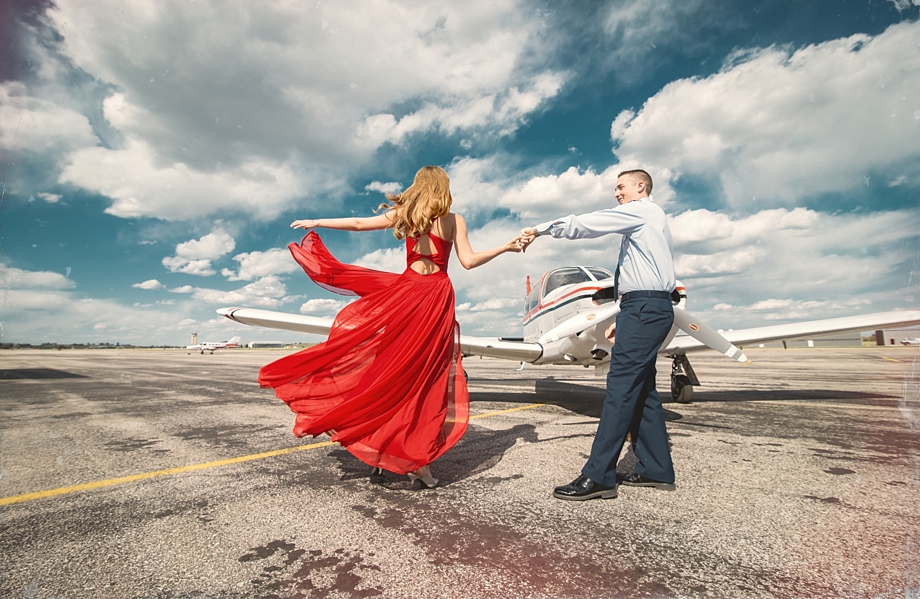 Vintage Engagement Session with airplane and red dress in Cheyenne and Laramie.