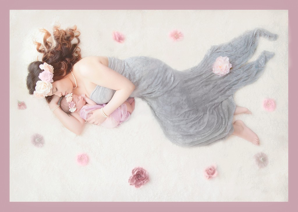 Gorgeous mother and child portrait featuring gray and pink tones.